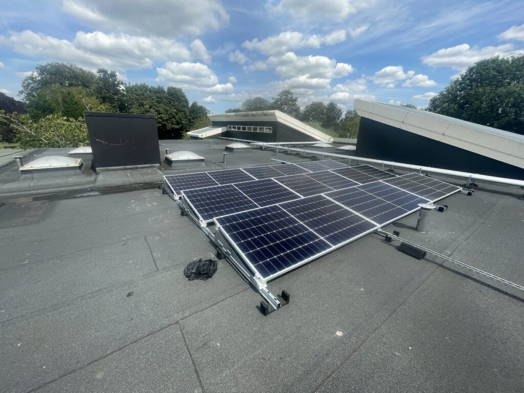 A rooftop with Solar PV panels installed