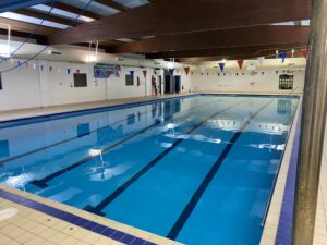 A large indoor swimming pool