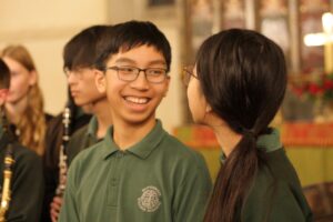 Pupils chatting animatedly.